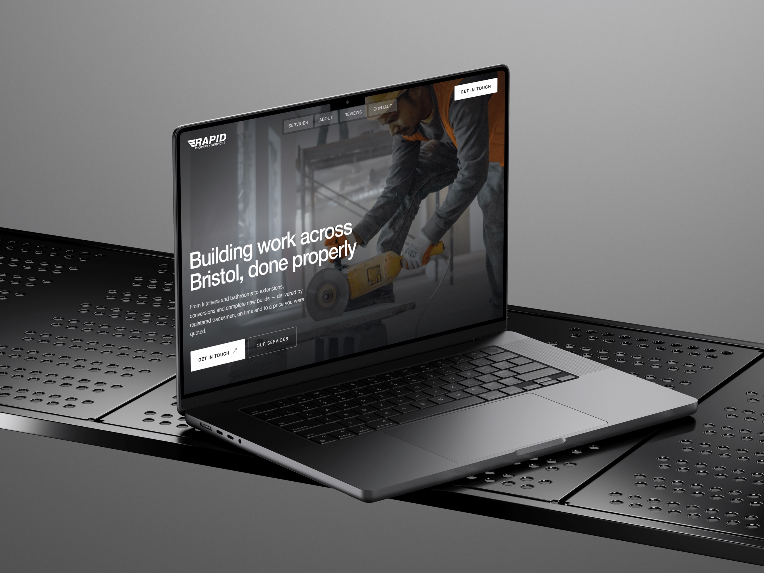 Rapid Property Services website designed by Sparq, shown on a laptop